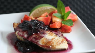 Pork Tenderloin with Peach Salsa and Blueberry Syrup