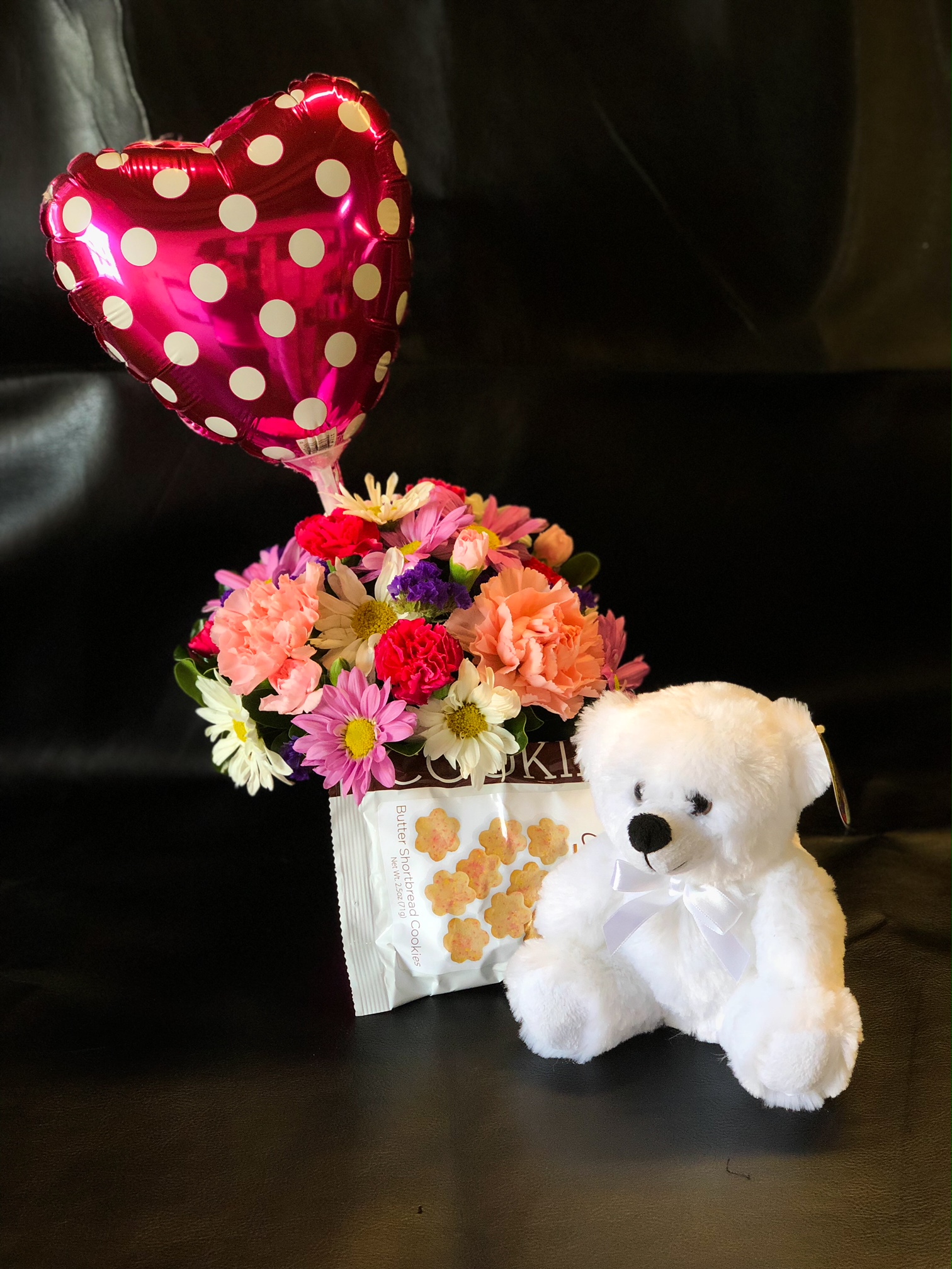flowers and teddy bear