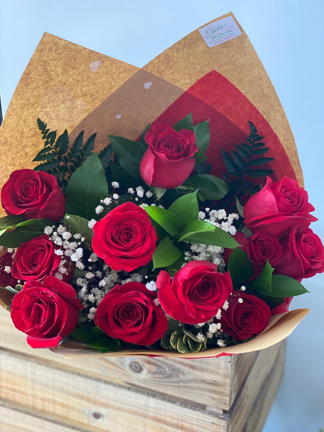 A dozen beautiful red roses hand-tied