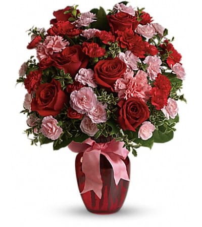 Red Roses and Pink Mini Carnations in Red Vase