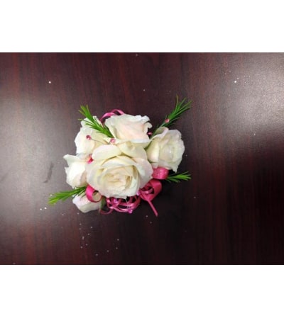 white roses pink ribbon