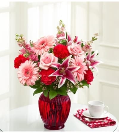 For All She Does™ in a Red Vase