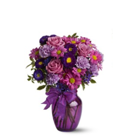 ASSORTED PURPLE FLOWERS ARRANGED ASSORTED PURPLE FLOWERS ARRANGED