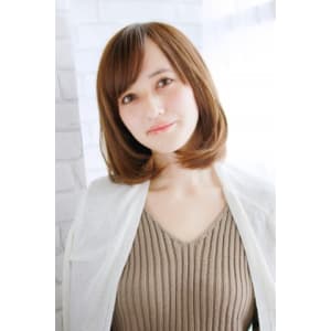 おろし流しの前髪の内巻きワンカールスタイル