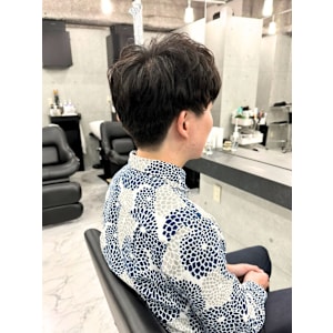 トップにボリュームに出るパーマスタイル