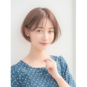 ピンクベージュのキュートスタイル。