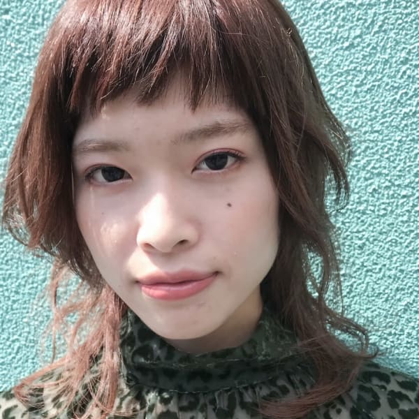 オレンジブラウンカラーで仕上げるウルフパーマ