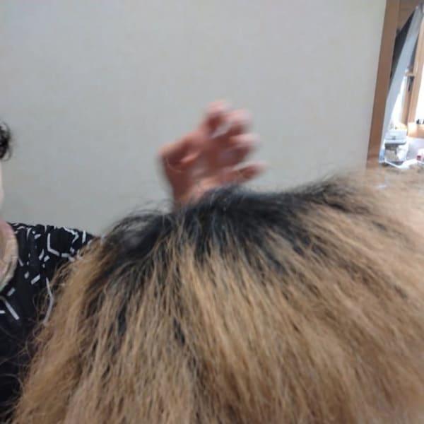 酸性縮毛矯正ビフォー癖が強くブリーチ毛　切れ毛がだいぶ有り。