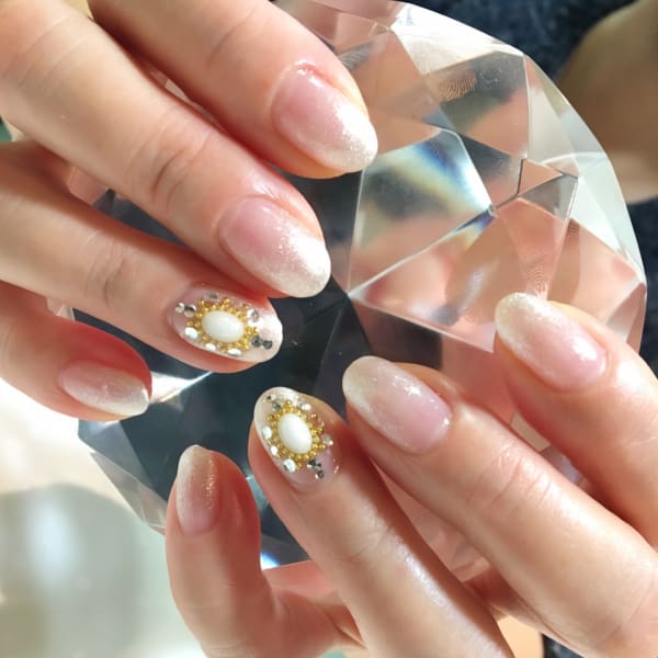 丁寧なネイルケア|Olivier