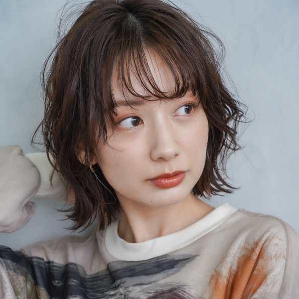 ふわっと軽やかなパーマスタイルで程よい抜け感と柔らかな質感でワンランク上の仕上がりに|CLEO hair international パセーラ店