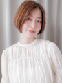 透明感カラーオレンジベージュかきあげショートボブ30代40代