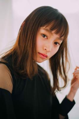 外ハネフェミニンスタイル