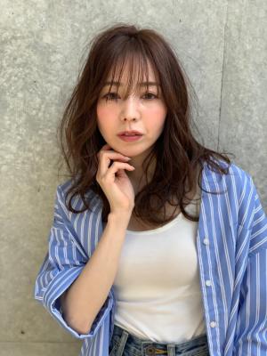ツヤツヤ質感のナチュラルウェーブ