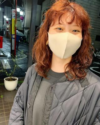 くるくるパーマとオレンジカラー