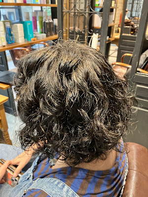 個性的ふんわりパーマ