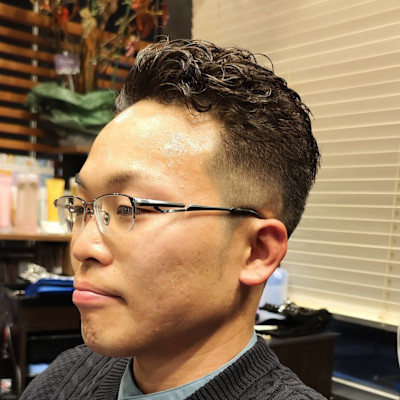 オールバック×ランダムスネークパーマ×フェードカット