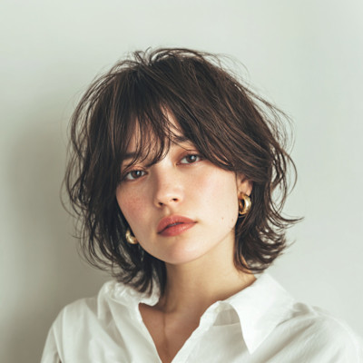 軽やかな動きが映える大人ゆるふわボブ