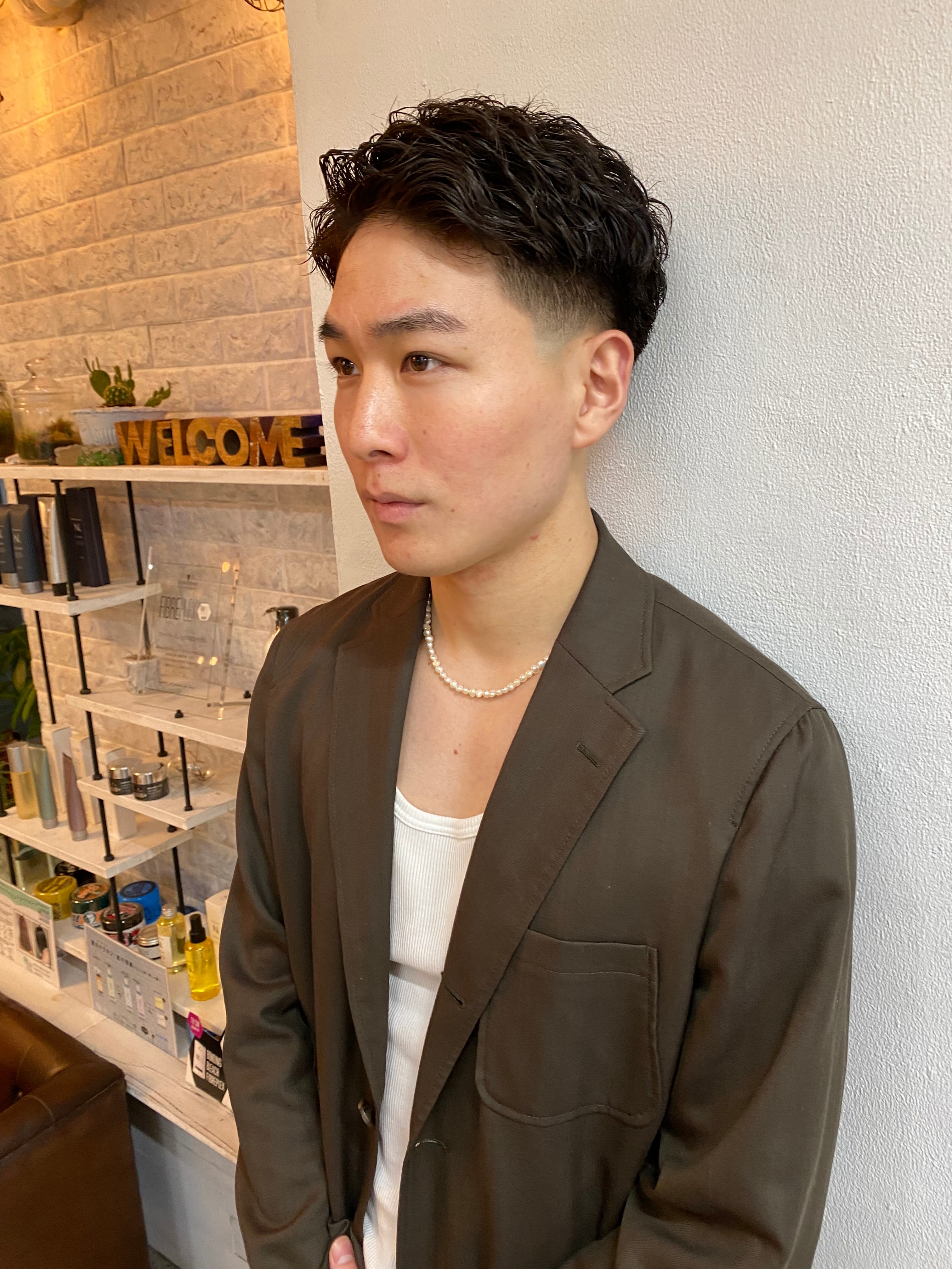 Hair ALES 原宿【ヘアーアレスハラジュク】のスタイル紹介。テーパーフェード/強めパーマ/ツーブロ/刈り上げ