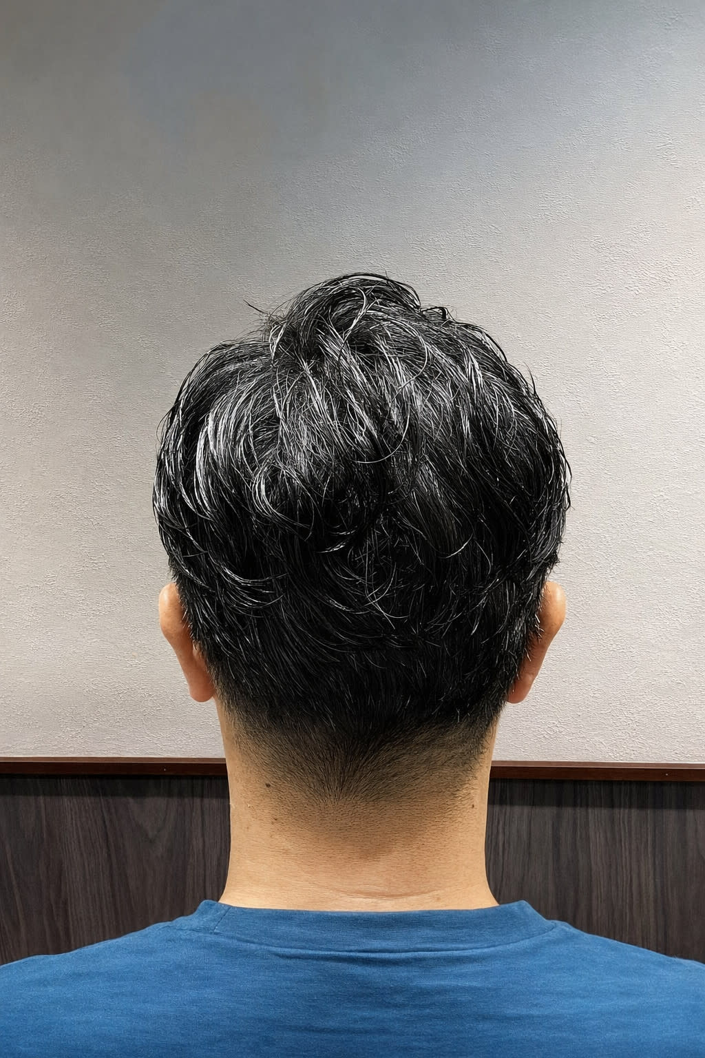 UN businessman barber【ユーエヌ ビジネスマン バーバー】のスタイル紹介。ツーブロックパーマ